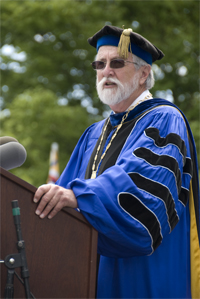 President Carothers in blue robes at commencement, 2008